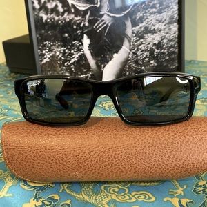 Rayban RB 4151 Polarized sunglasses in black with retired smoke gray lenses.